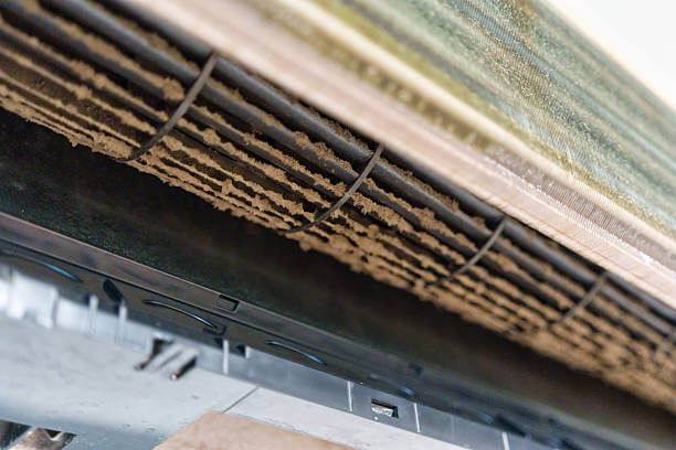 Ac covered with mold & dust